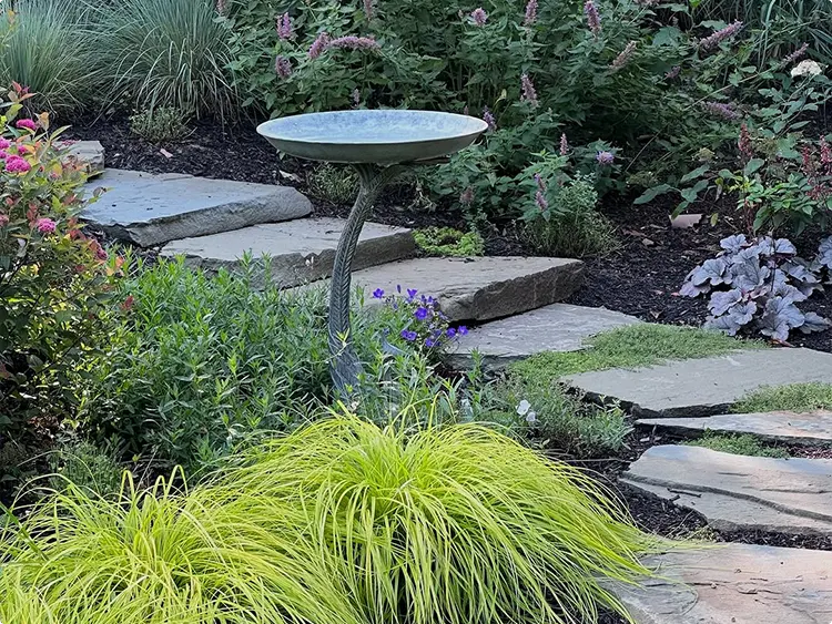 Flagstone Garden Path and Metal Bird Bath