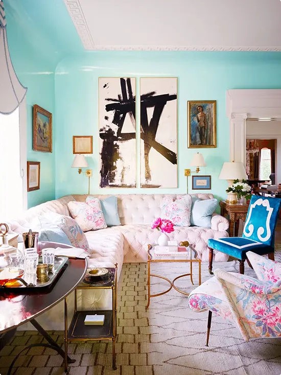Glossy Mint Blue Wall With Abstract Paintings