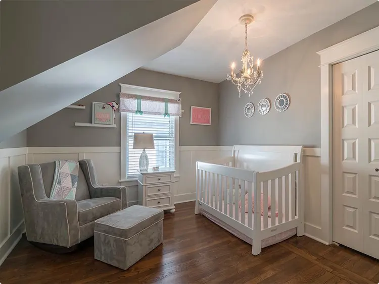 Nursery with Pink Details and a Crystal Chandelier