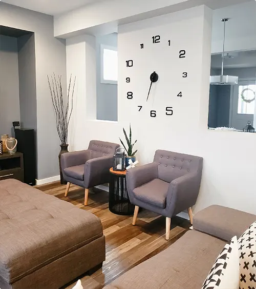 Oversized Modern Clock with Two Modern Chairs
