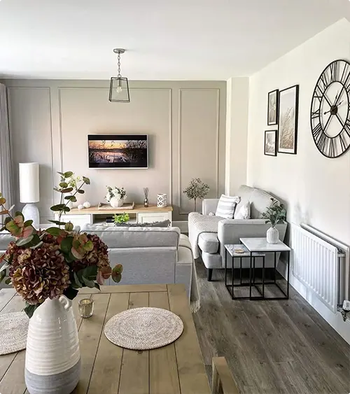Subtle Light Gray Paneled Walls with Floating Wood Shelves