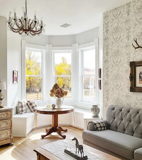 Tufted Sofa by a Living Room Bay Window