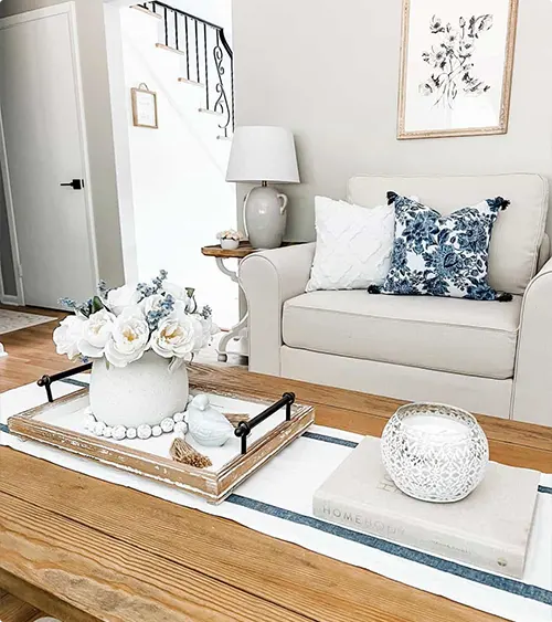 White Coastal Living Room with Navy Accents