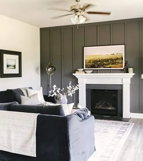 White Fireplace Mantel with Vertical Dark Gray Accent Wall Paneling