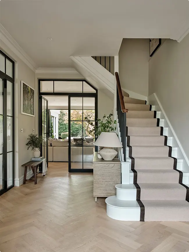 Black Framed Glass Door Neutral Staircase