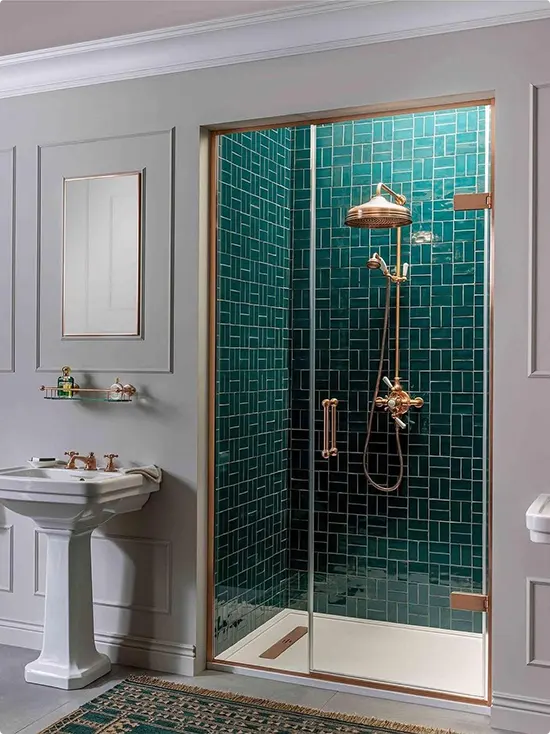 Rose Gold Fixture with Deep Teal Brick Tile and Classic White Paneling