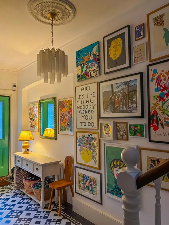 Eclectic Art Gallery on a Staircase Wall