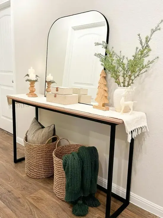 Natural tones and woven baskets in a Christmas hallway
