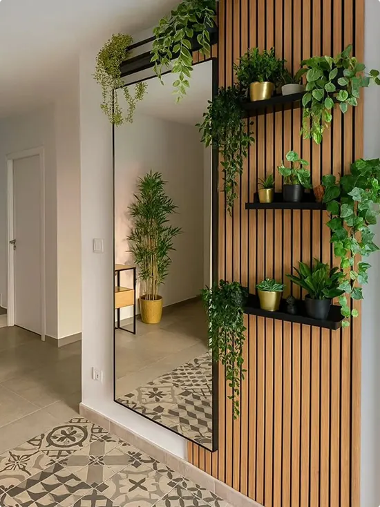 Slat wall floor mirror display with trailing plants