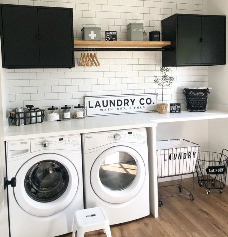 Adorable Laundry Room with Basket Storage and Folding Area