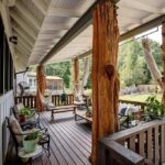 back porch tree posts wood rails