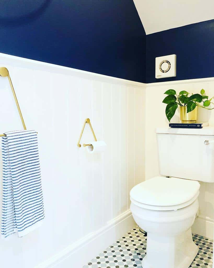 bathroom-wall-paneling-ideas-larabelleathome bathroom white wall paneling blue wall toilet