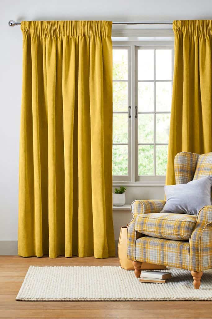 bold yellow curtains in living room