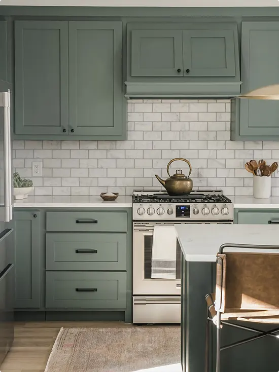 Brick Lay White Subway Tile and Sage Cabinets