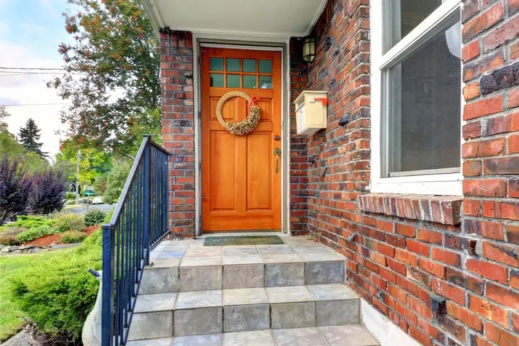 burnt-orange-front-door-for-red-brick-house Burnt Orange Front Door For Red Brick House