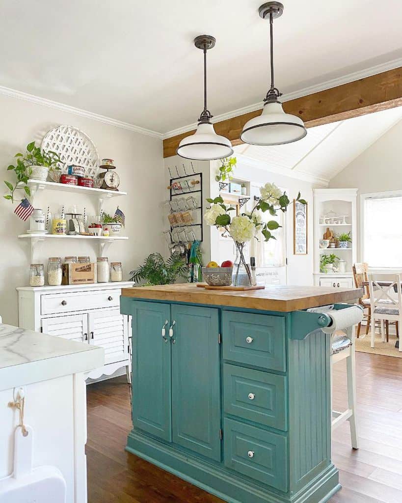 farmhouse kitchen with green cabinet island butcher block countertop