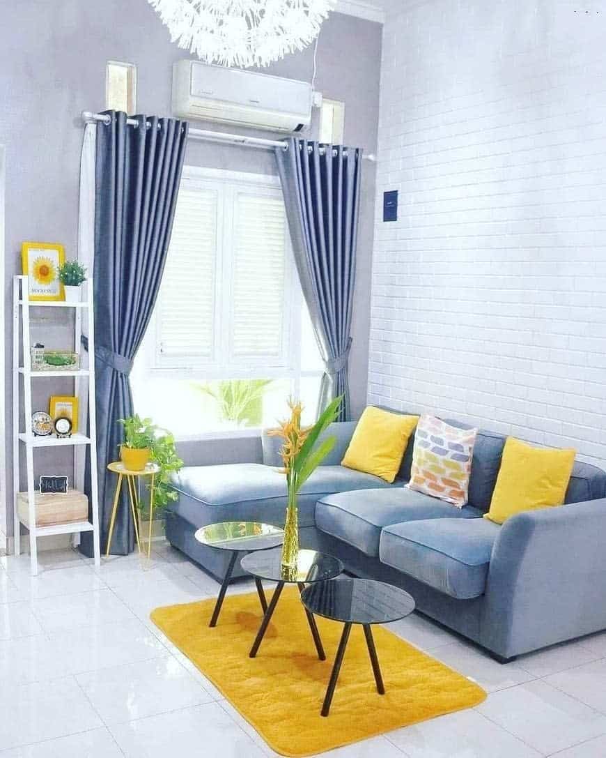 bright living room gray sofa and curtains