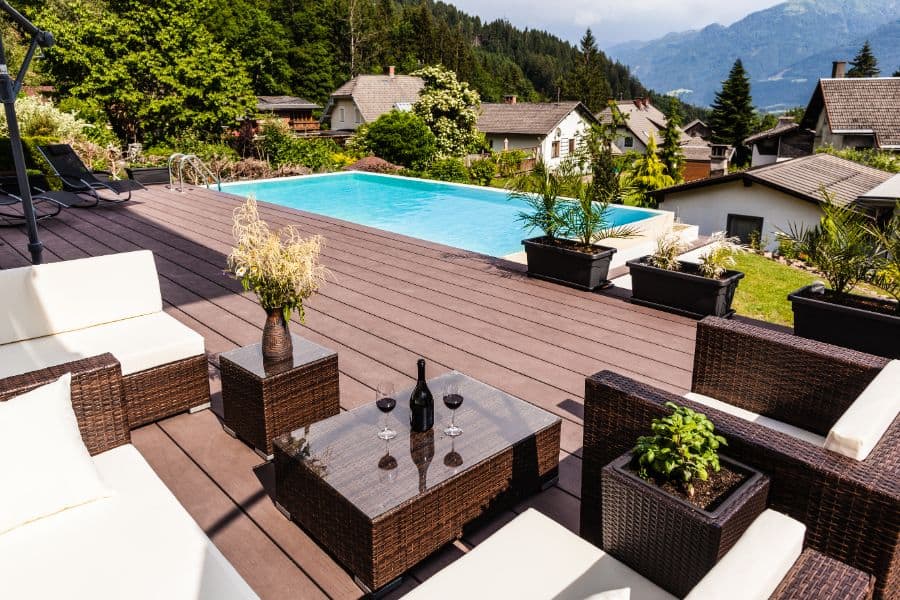 composite-material-pool-deck-ideas-5 elevated wood deck pool backyard
