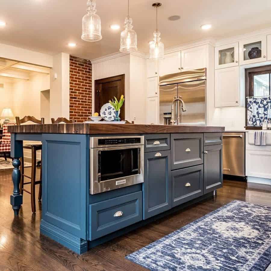 contemporary small kitchen with blue island