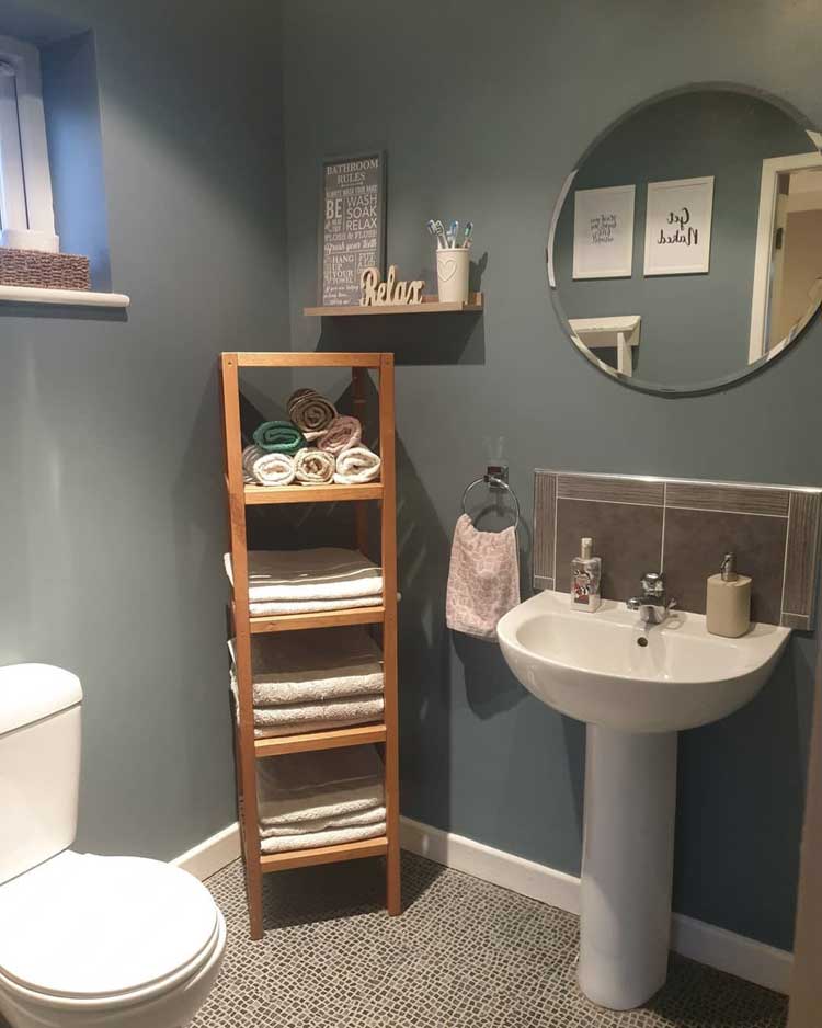 Convenient Corner Storage In Small Bathroom Area