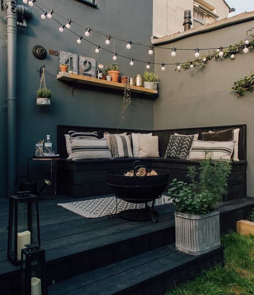 deck-patio-lighting-ideas-puntodereves small corner deck patio with bench seating and string lights