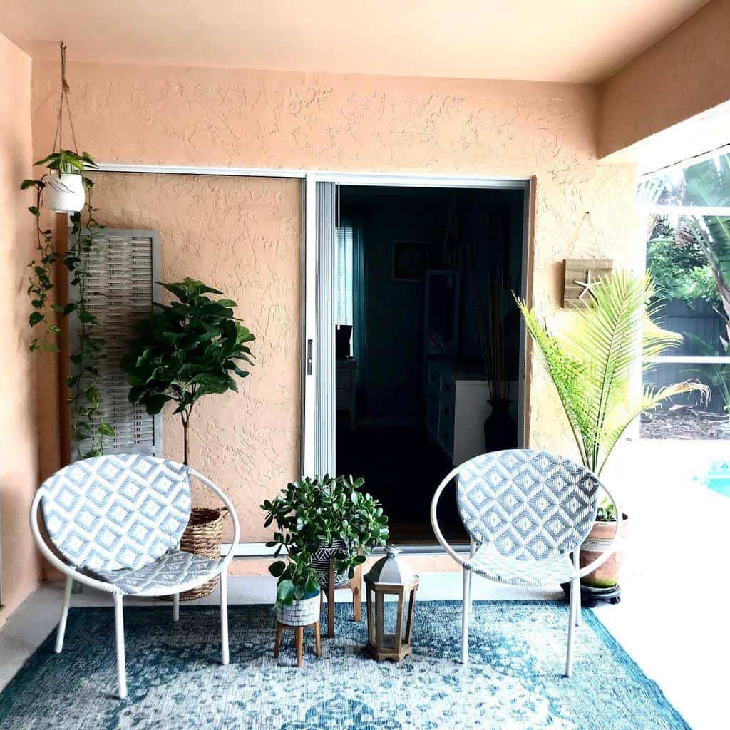 small outdoor patio two chairs plants