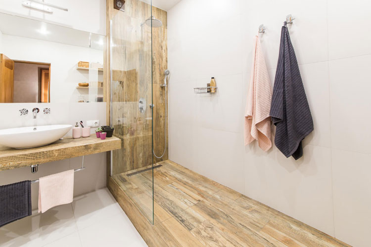 Doorless Walk In Shower with Wood Flooring