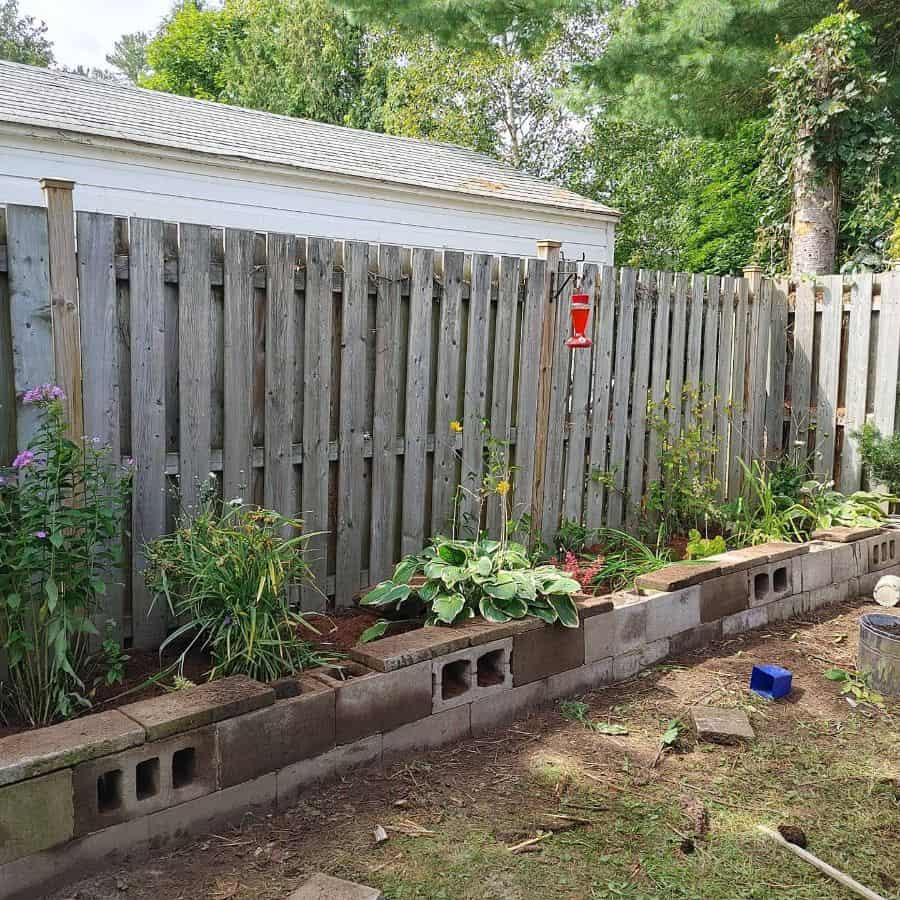cement block retaining wall backyard