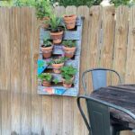 garden fence pallet planter potted plants