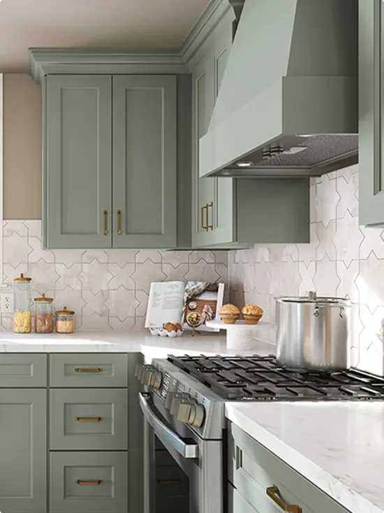 Geometric warm tile beside a sage hood