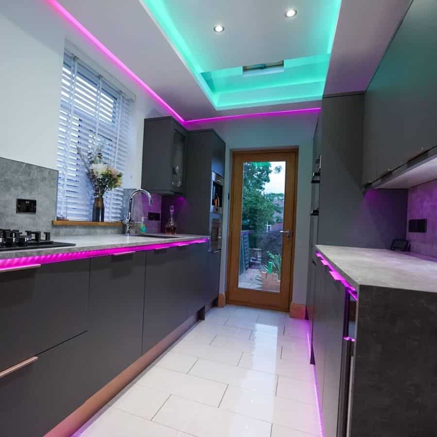 small gray kitchen with purple led lighting