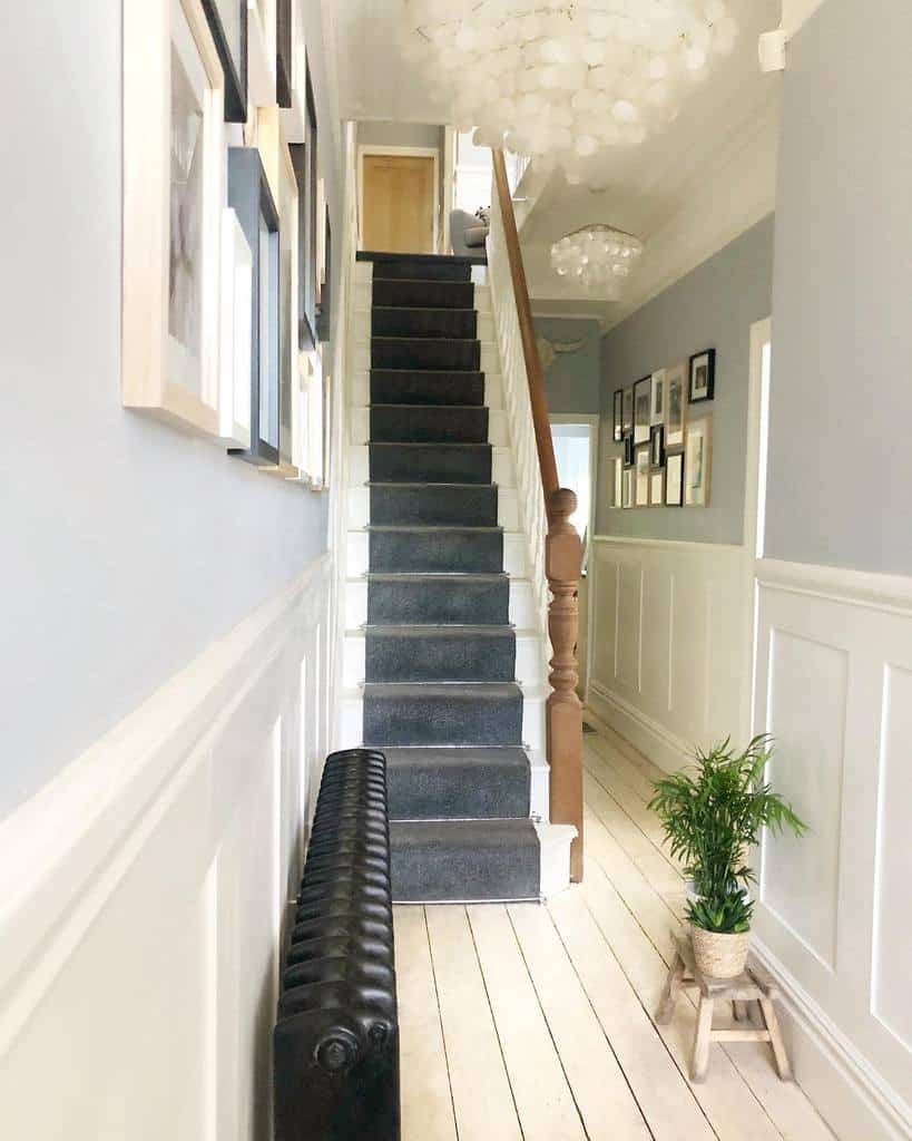 hallway-wall-paneling-ideas-my1908home hallway gray carpet stairs wood banister