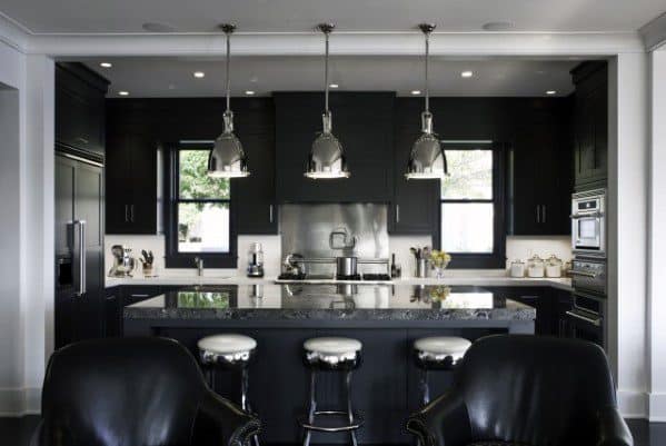 modern black kitchen with large island breakfast bar silver ceiling pendant lights