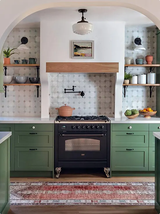 Kitchen with arched framing and soft gray tile in a diamond pattern
