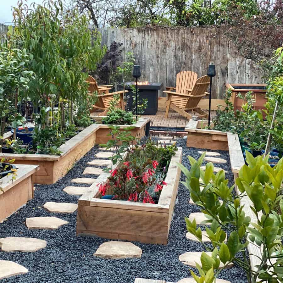 large backyard with wood box raised garden