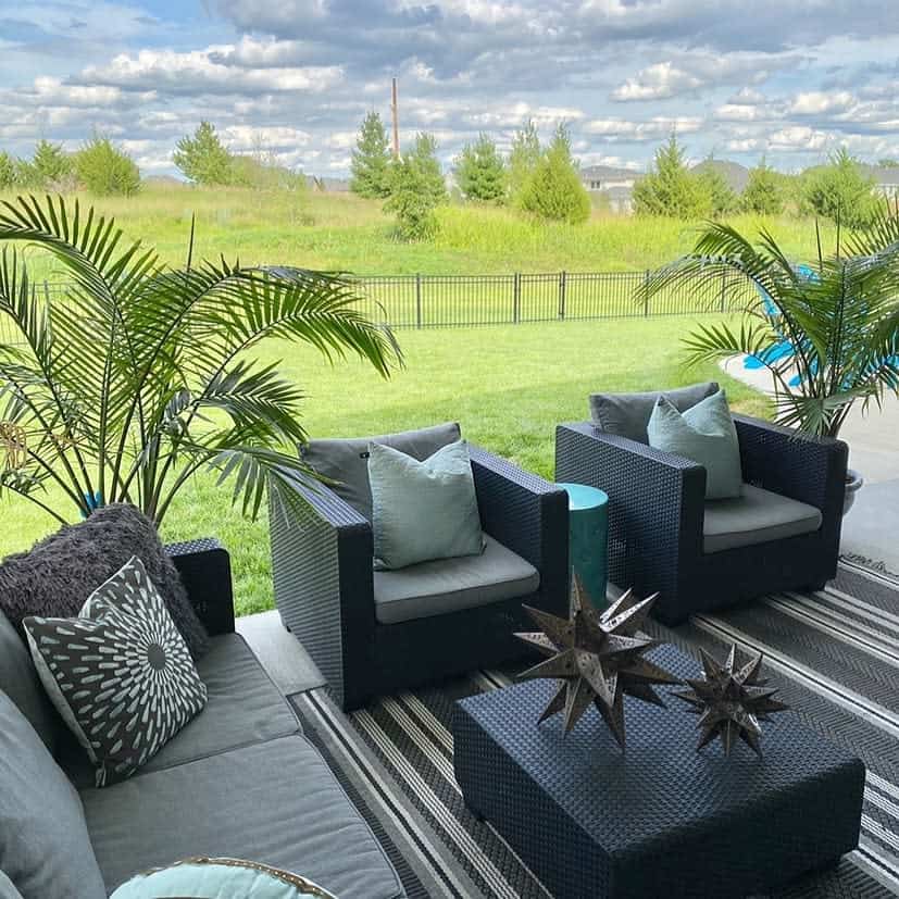 modern covered patio large grass area outdoor setting