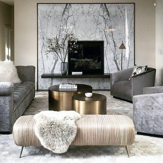 modern living room with gray sofas and ottoman
