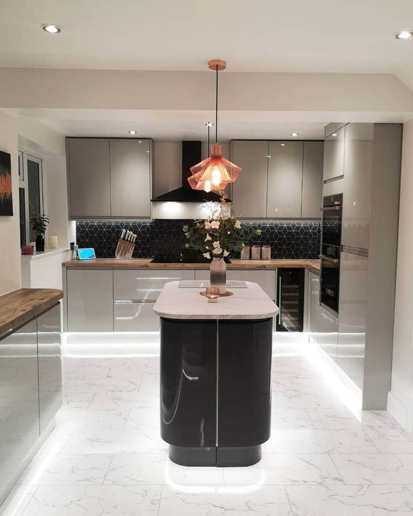 small modern kitchen with under cabinet led lighting