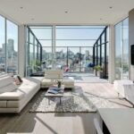 large apartment living room white sofa city view