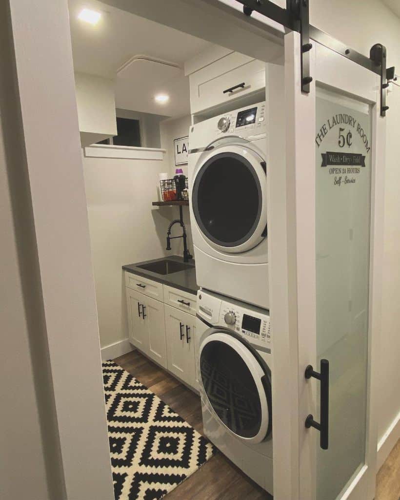 narrow-laundry-room-sink-ideas-dpdesignstudio stacked washer and dryer in cabinet with glass sliding door