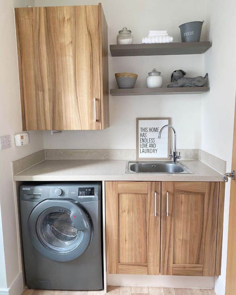 narrow-laundry-room-sink-ideas-our_home_at_62 simple narrow laundry wood cabinets wall shelves