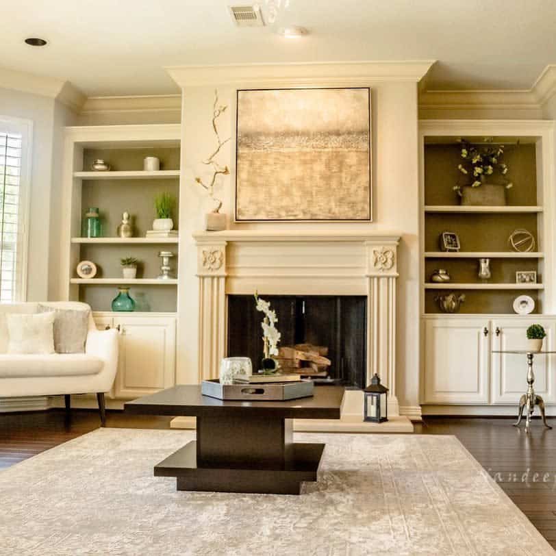 neutral living room grand fireplace