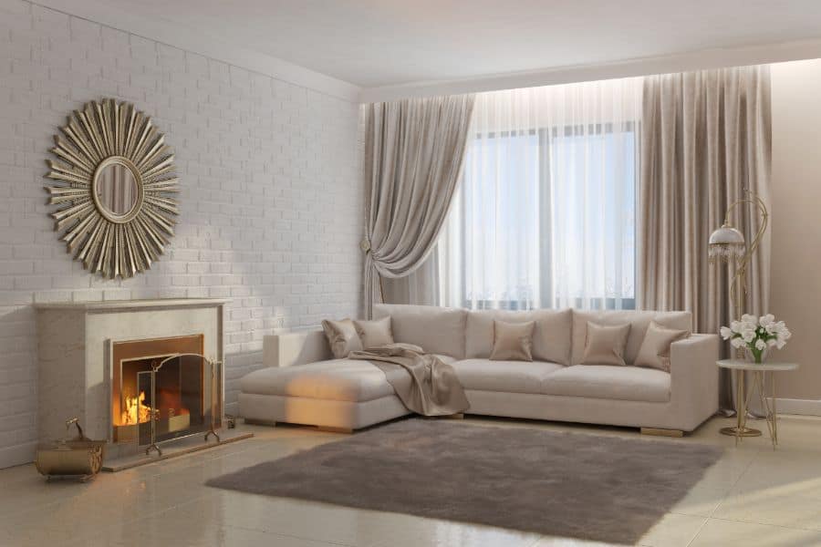 neutral living room fireplace and sofa
