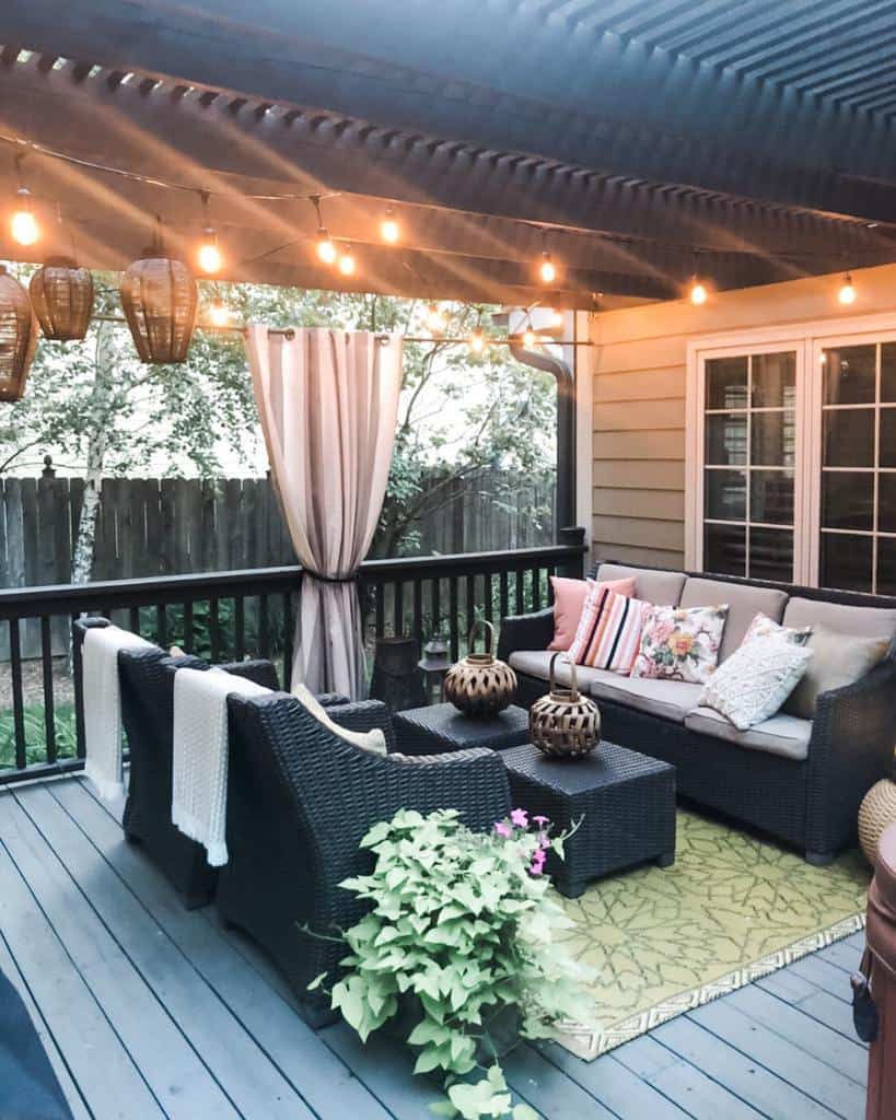 outdoor-patio-lighting-ideas-e-lynndesign large outdoor wood patio deck with wicker furniture
