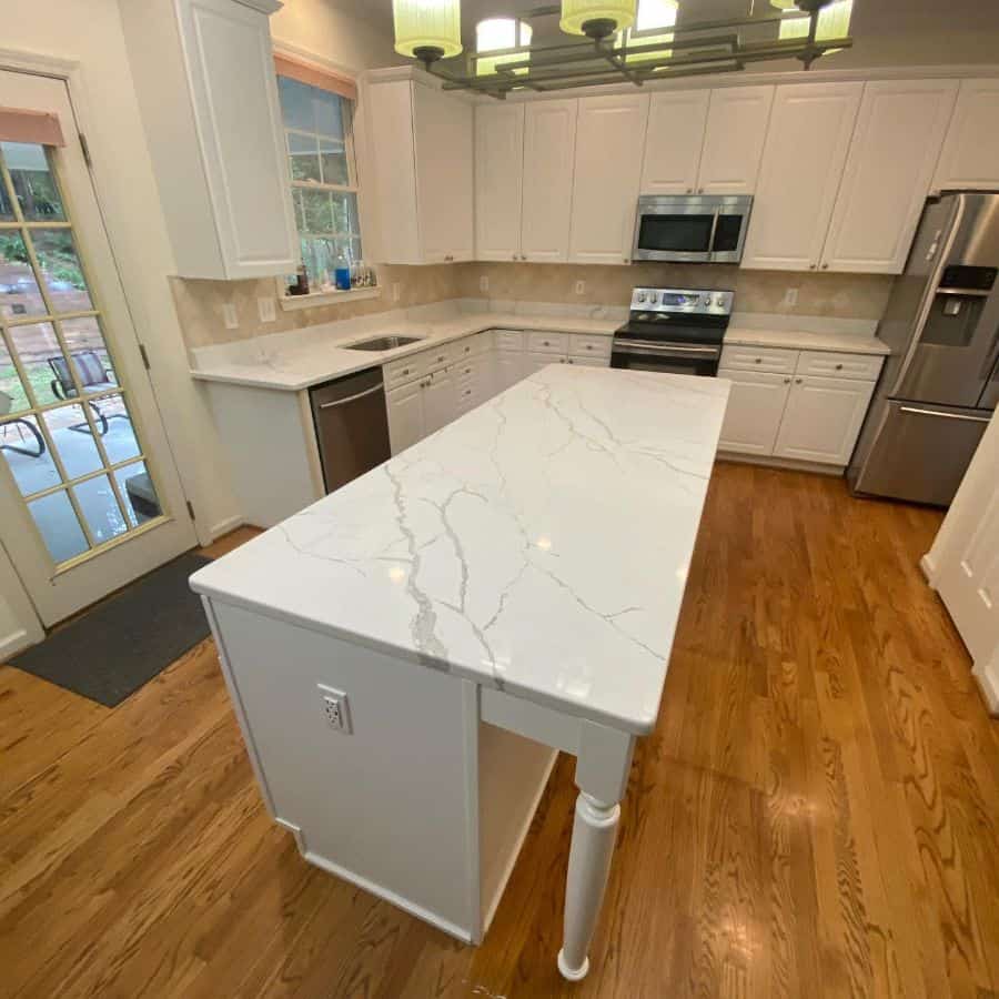 small kitchen with quartz topped island