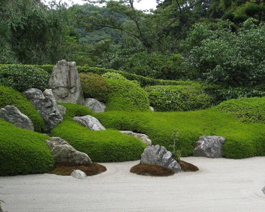 rock-zen-garden-ideas-4 sand garden green shrubs