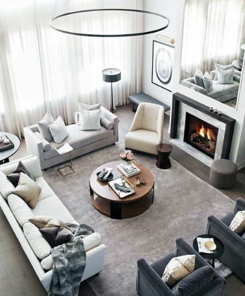 modern living room with fireplace and sofas