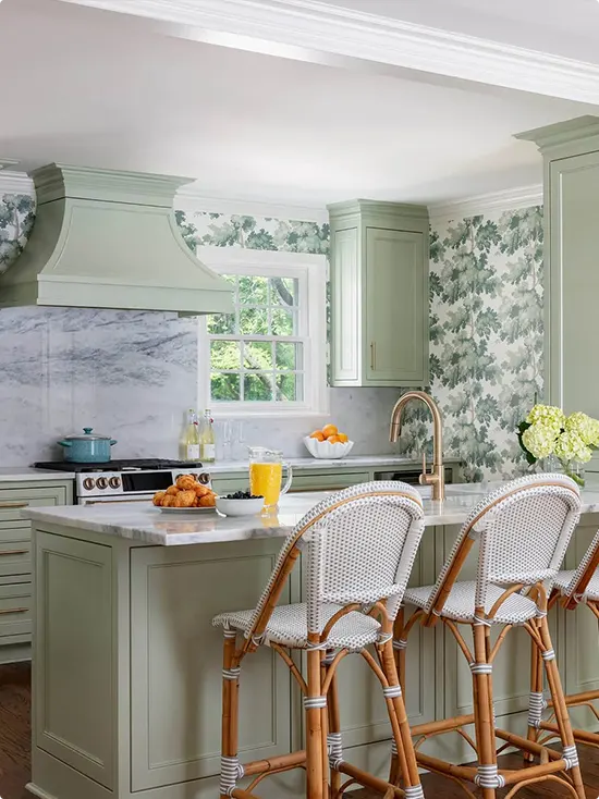 Sage Green Cabinetry With Leafy Wallpaper
