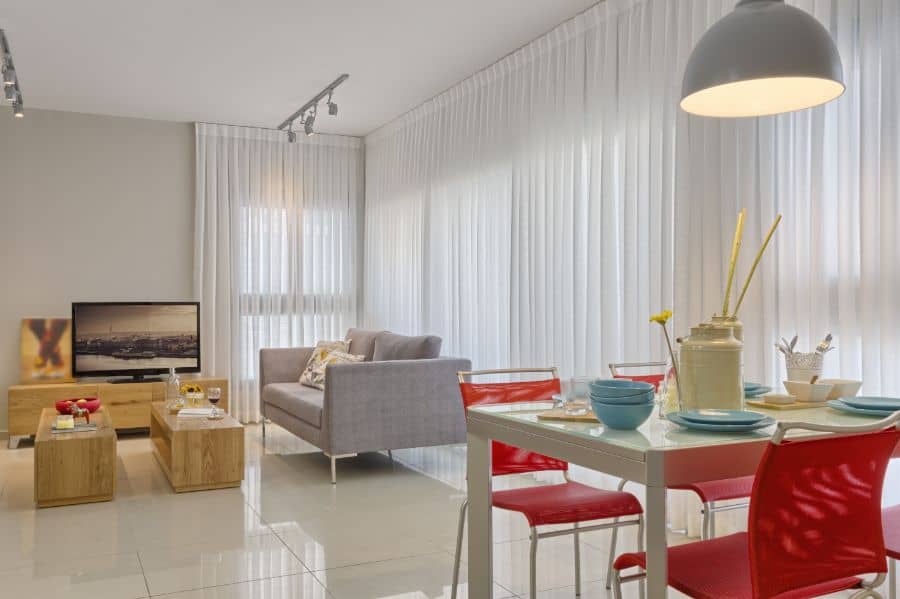 modern living room with dining table and sofa