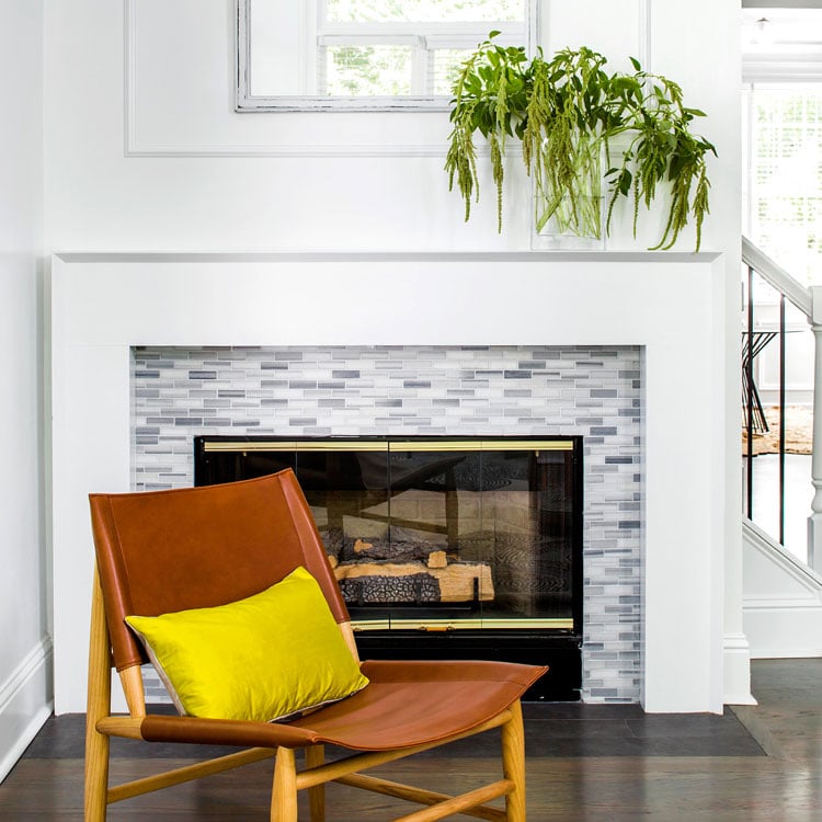 simple-tiled-fireplace-with-white-surround Simple Tiled Fireplace with White Surround